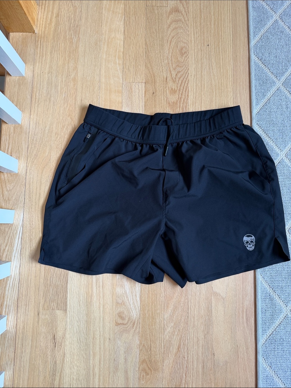 Men's Black Athletic Shorts with Subtle Skull Accent